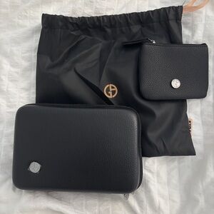 Giorgio Armani x EVA AIR amenity bag including coin pouch and Jurlique skincare